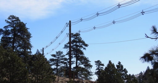 Aerial Covered Conductor Systems as a Wildfire Mitigation Tool